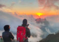Hikers watching sunrise above the clouds at Doi Luang Chiang Dao in Chiang Mai, Thailand